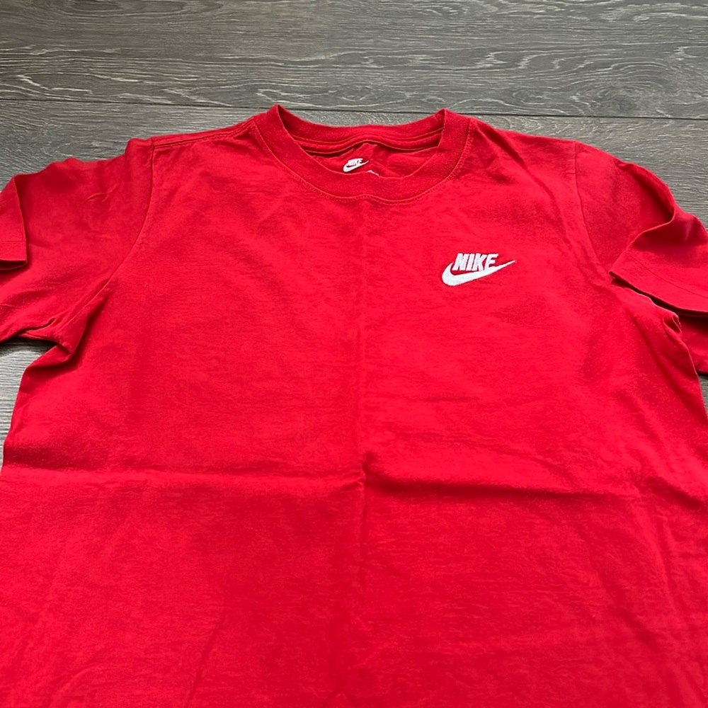 Boys red Nike Tshirt. Size medium 10-12